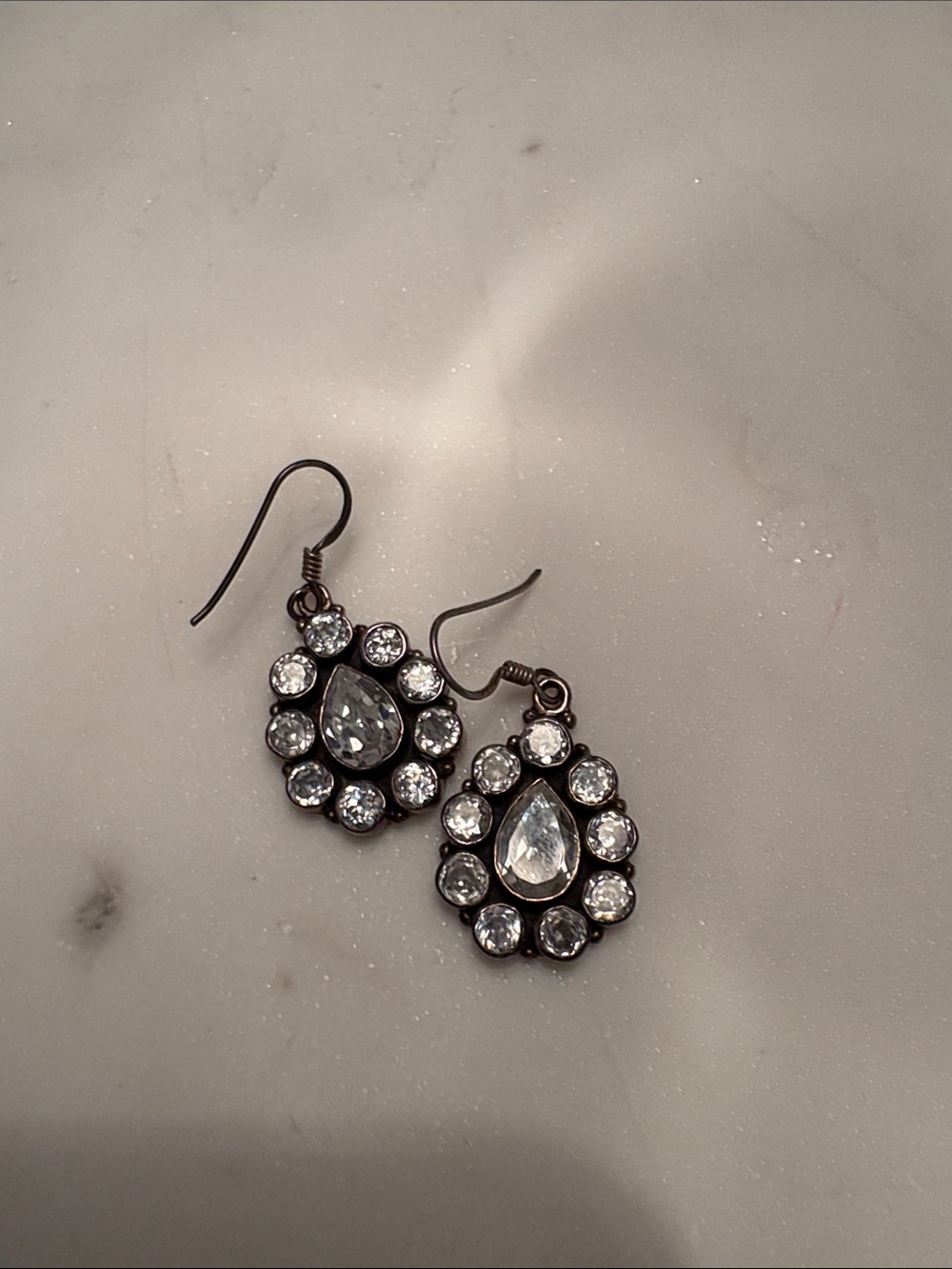 Vintage mid century sterling silver with clear accent gems stamped SIL earrings